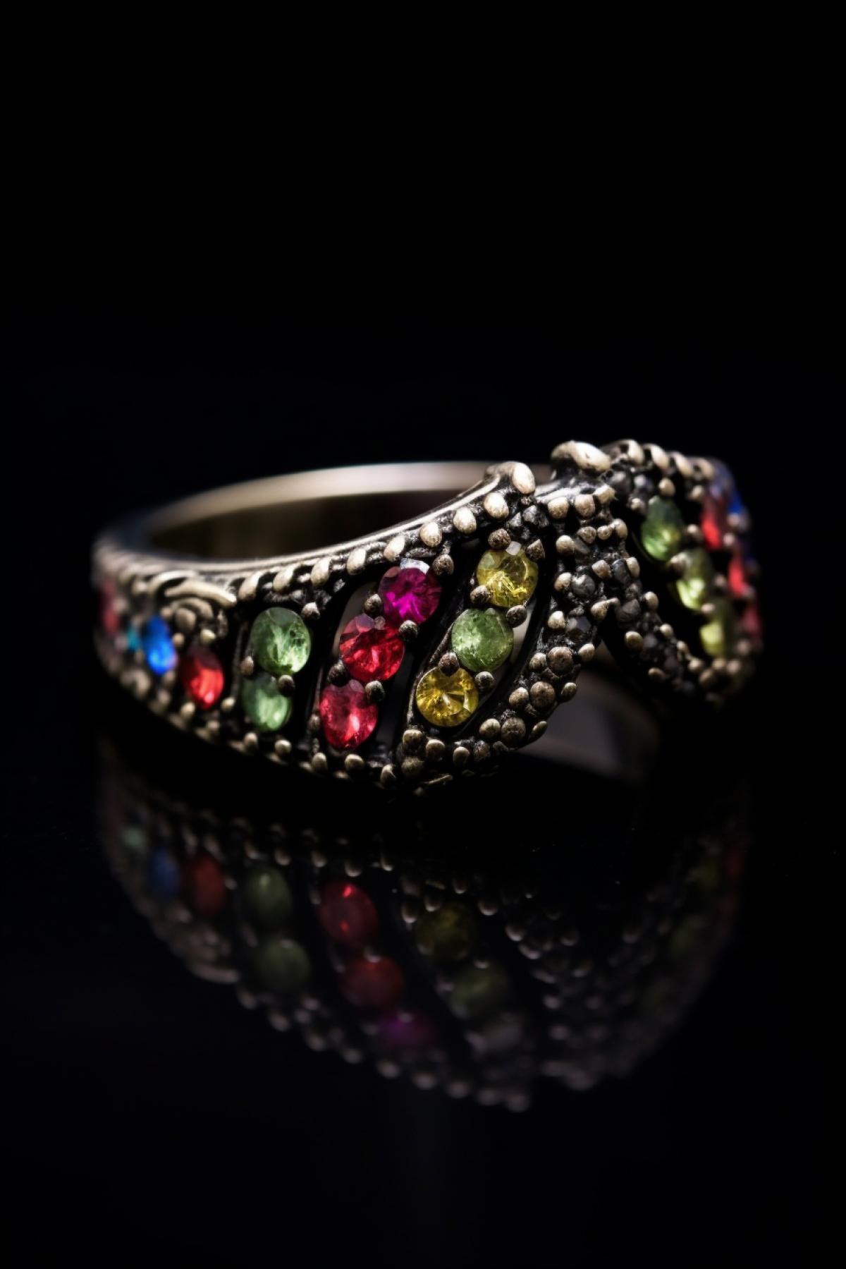 a close up of a ring with different colored stones, by Itshak Holtz, instagram, featuring rhodium wires, japan grungerock from colors, prideful look, front shot