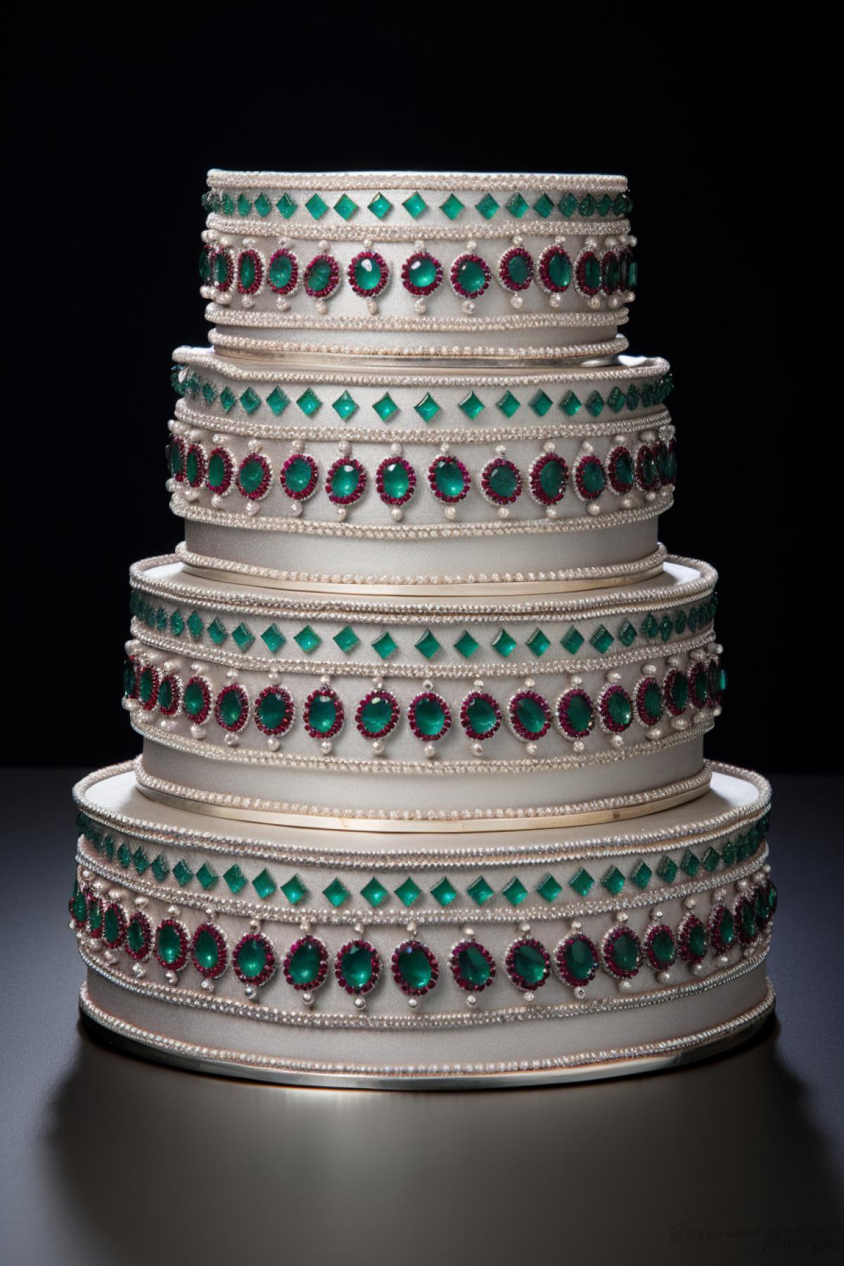 Jewelry cake made of silver with rubies and emeralds