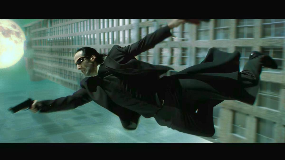 A man in dark glasses and a long leather coat flies down from a skyscraper and shoots from a pistol in flight, a still from the science-fiction film The Matrix, there is an eclipse in the sky the corona of the sun is visible from behind the moon, 4K quality, maximum details.