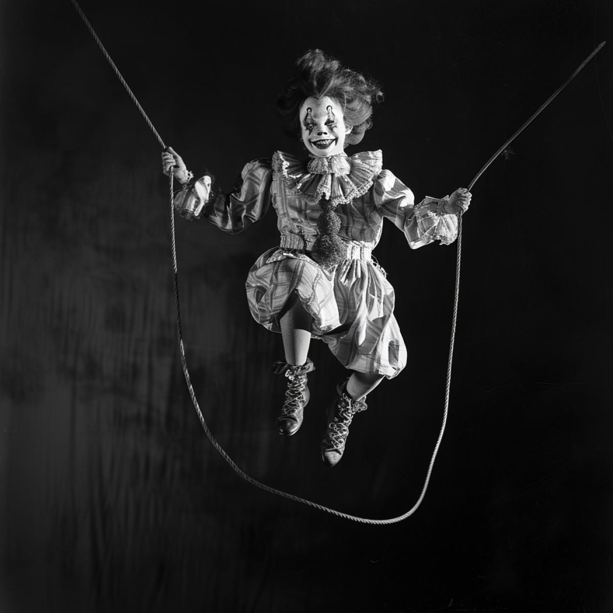 Clown jumping rope