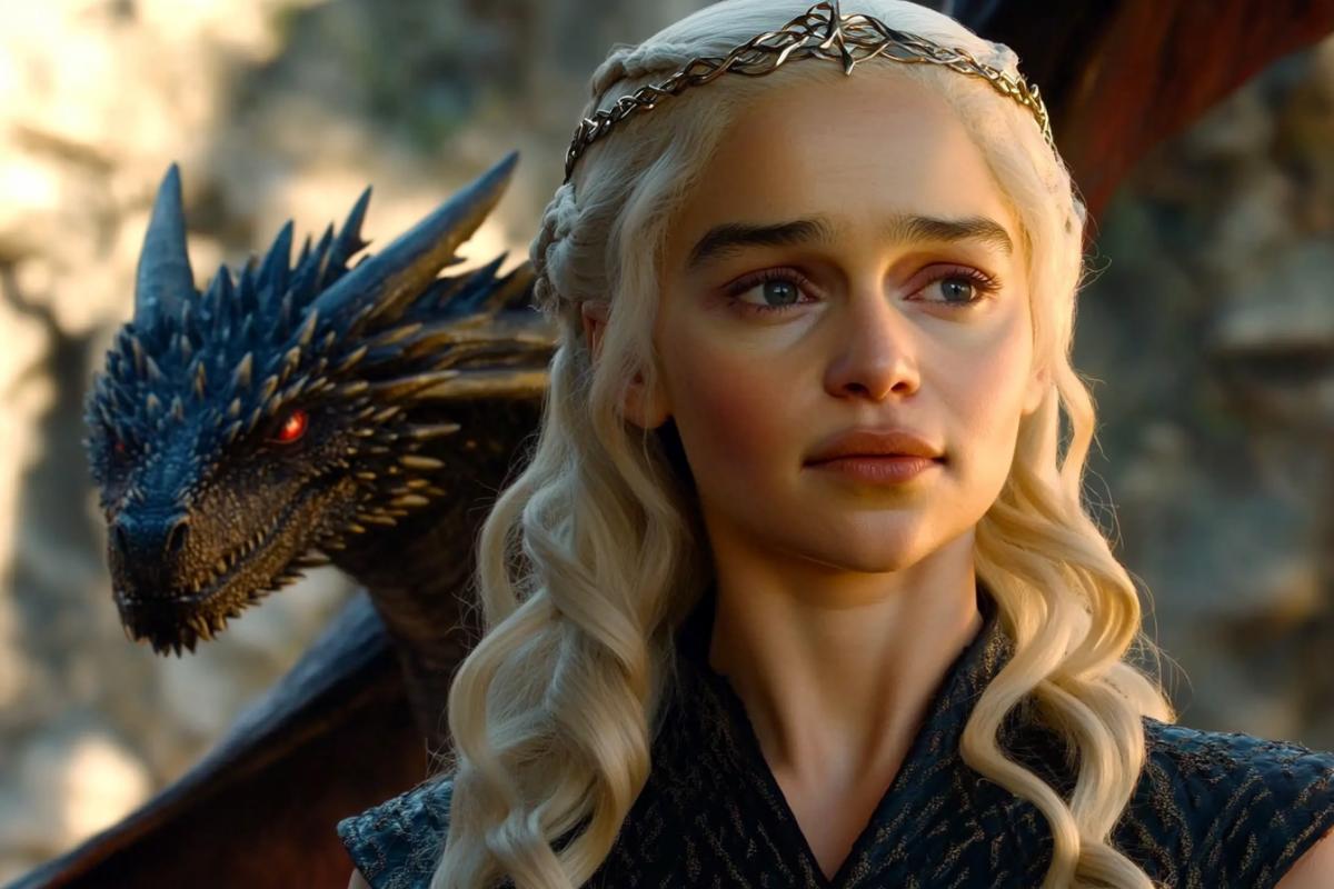 Daenerys, from the movie \"Game of Thrones\", depict on her head a thin golden tiara, with a young dragon, against the background of a round golden disk with diverging small round golden disks