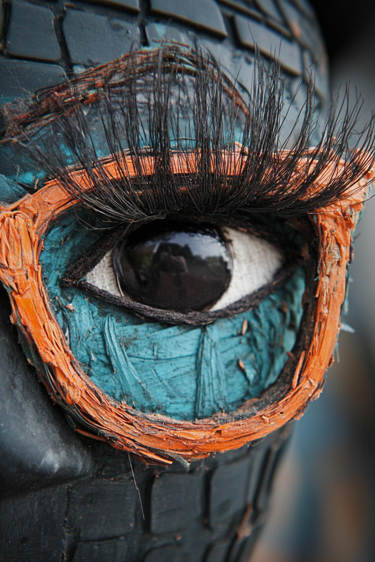 Glasses frame made from tires, thick long eyelashes at the top