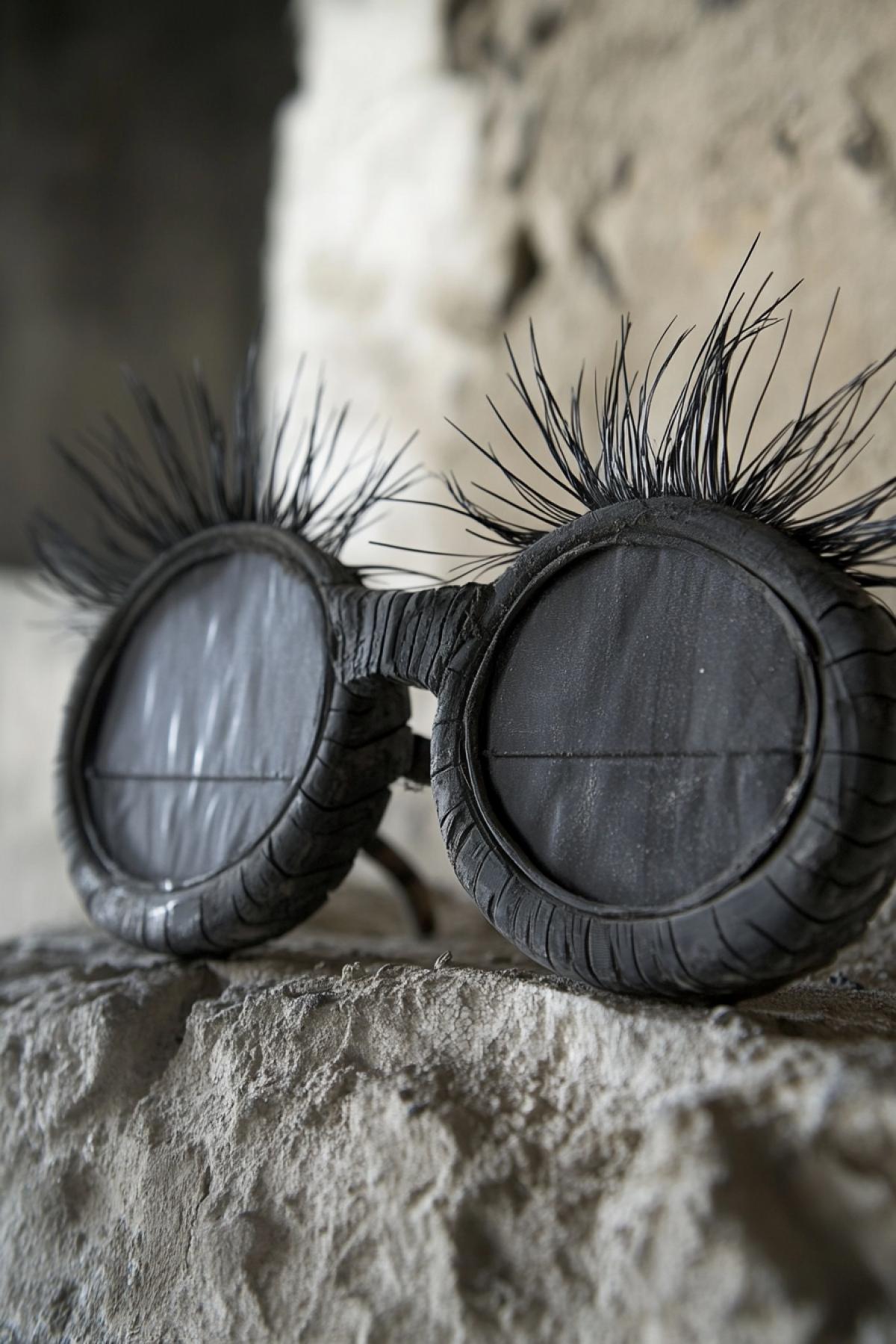 Glasses frame made from tires, thick long eyelashes at the top