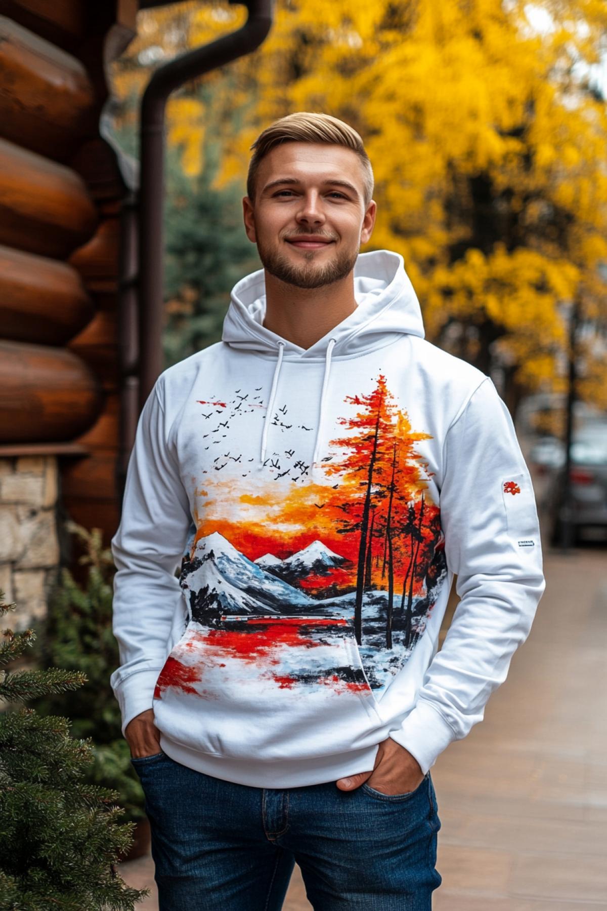 An elegant man in a volume hoodie with a print in the style of paintings by the artist Kandinsky
