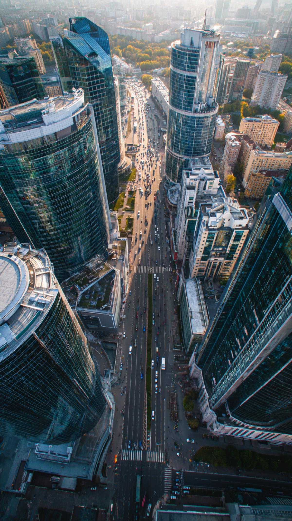 View of the city street from the skyscraper. Futurism