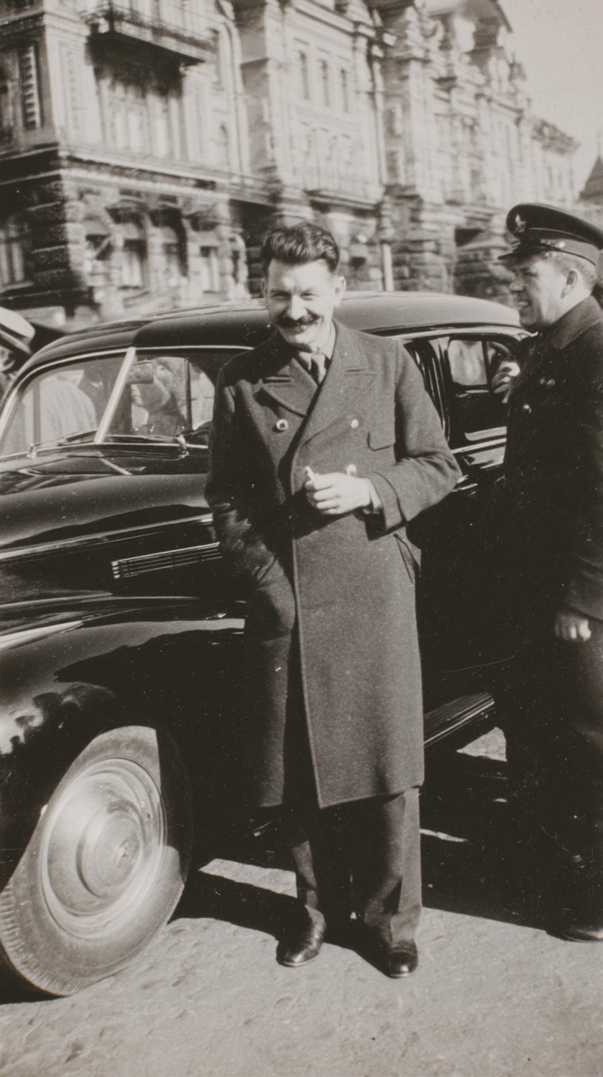 Joseph Stalin next to the Soviet car GAZ-M-20 Victory, smile, smoking pipe, Moscow, photo 1950