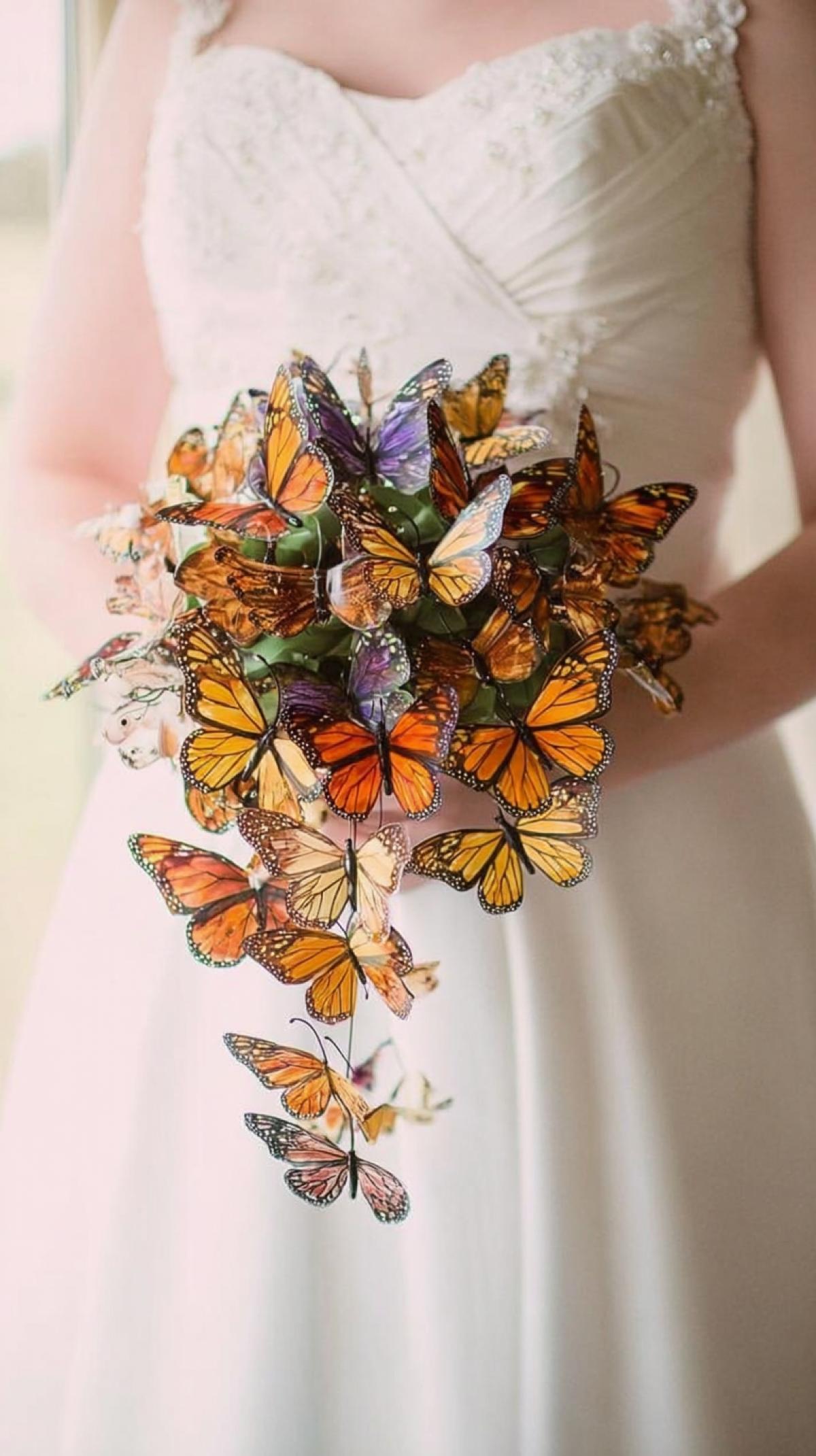 bouquet of butterflies in the brides hands, super detailed