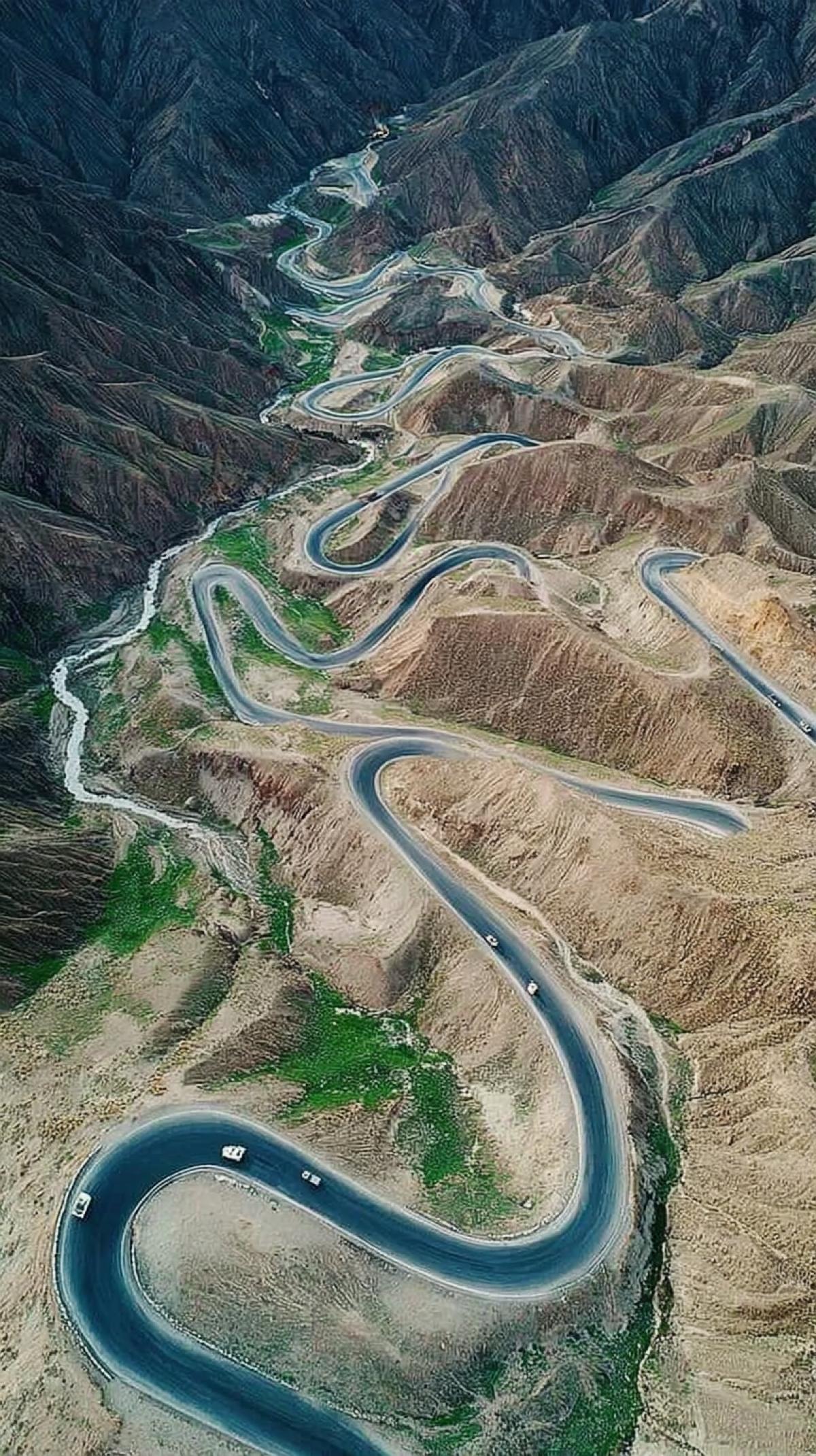 Aerial view of the Sky Road Plateau in Xinjiang, amazing winding road, breathtaking scenery