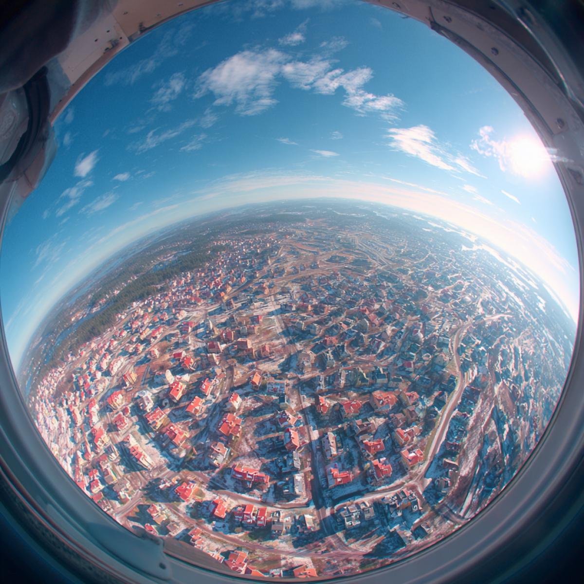 View from a birds flight to a childrens town. The lens is frying the eye