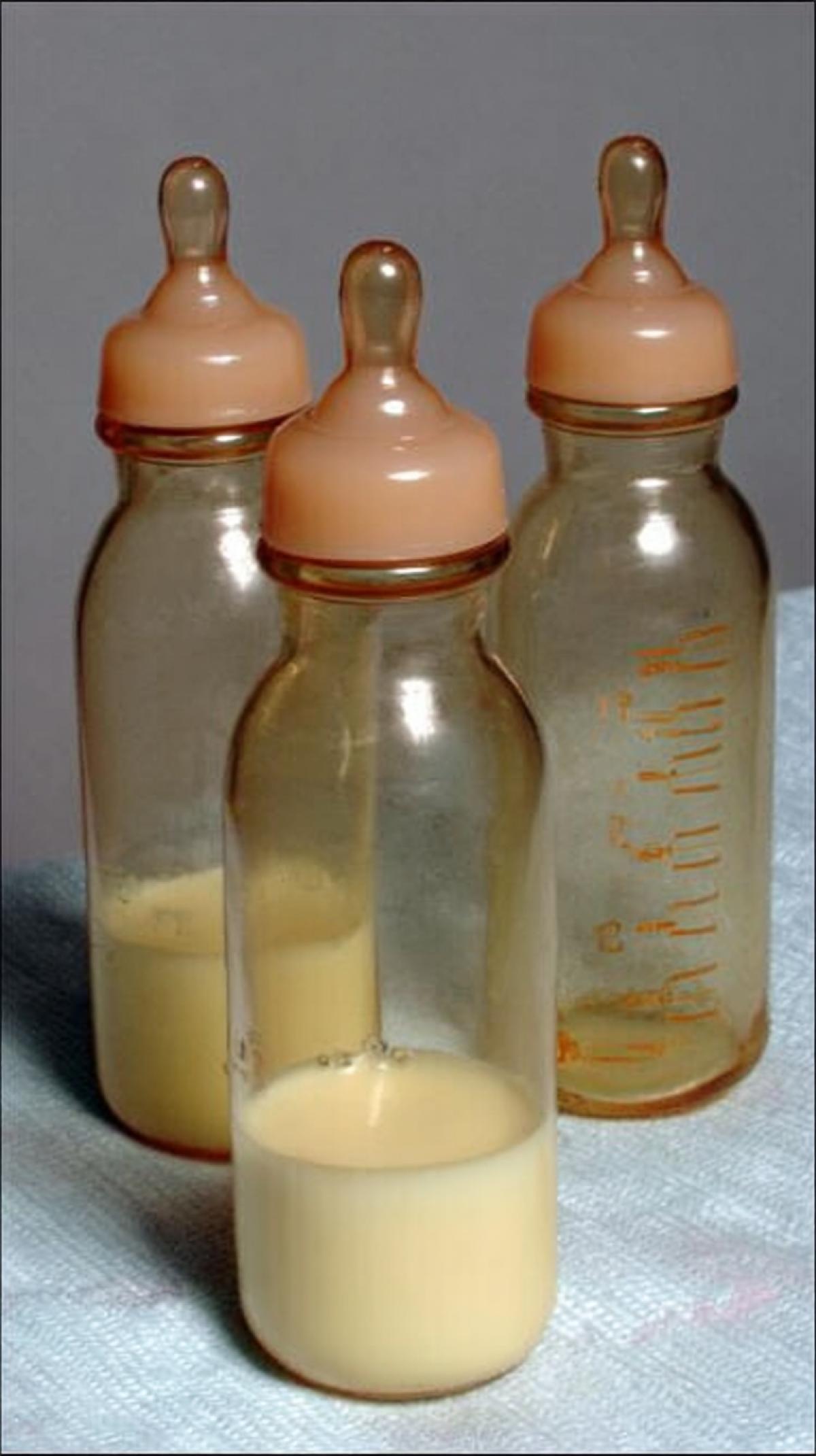 glass baby bottle with a rubber , USSR