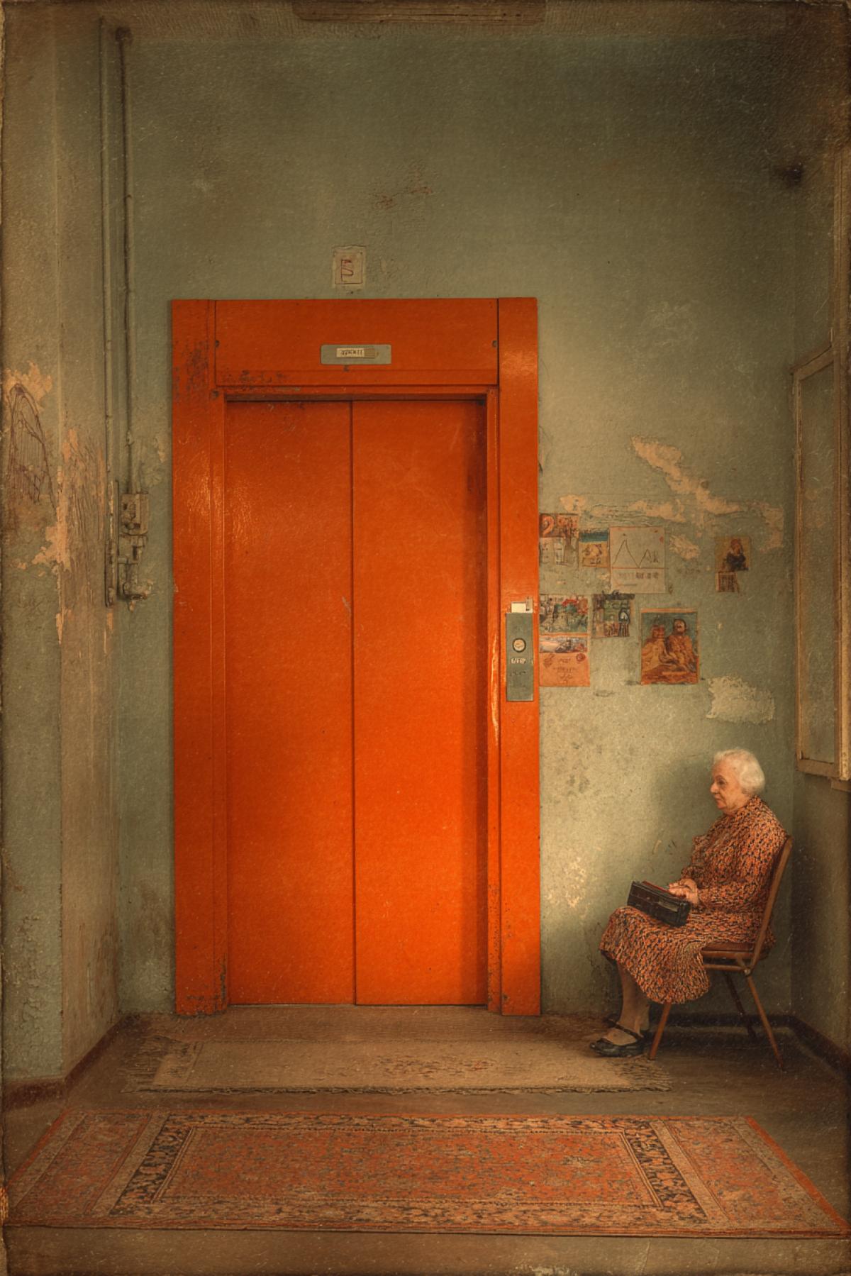 Bright orange elevator in Khrushchev. On the walls are scratches and childrens drawings, on the floor a battered rug. In the corner there is a teenager with a cassette player, by the window-a grandmother with a net grid. Photorealism, vintage film texture, warm suns rays from a small window