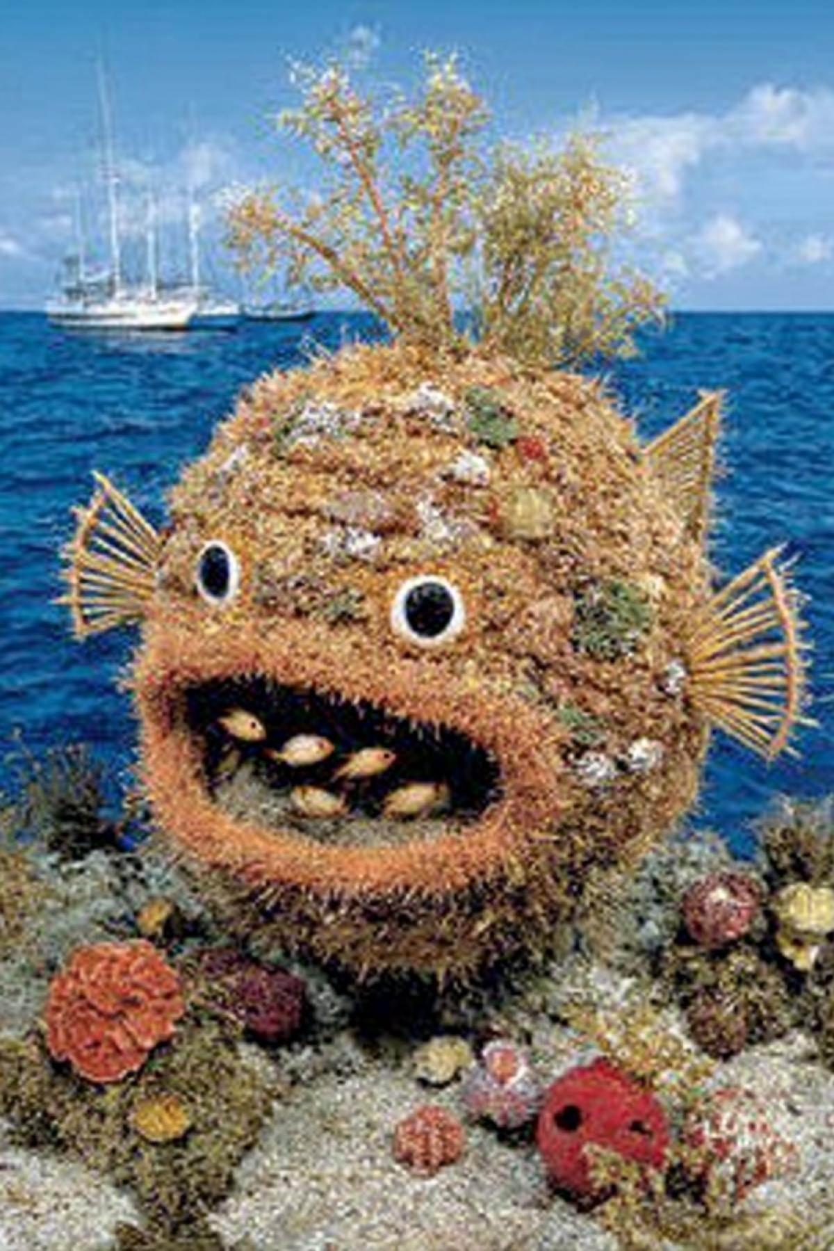 A photograph of an underwater river monster, similar to a large stone or a small cliff, with an open mouth that looks like an entrance to the cave, glowing from the inside with a greenish light, small eyes above the mouth and large fins on the sides, disguised as river algae. Small fish swim around and swim in its mouth