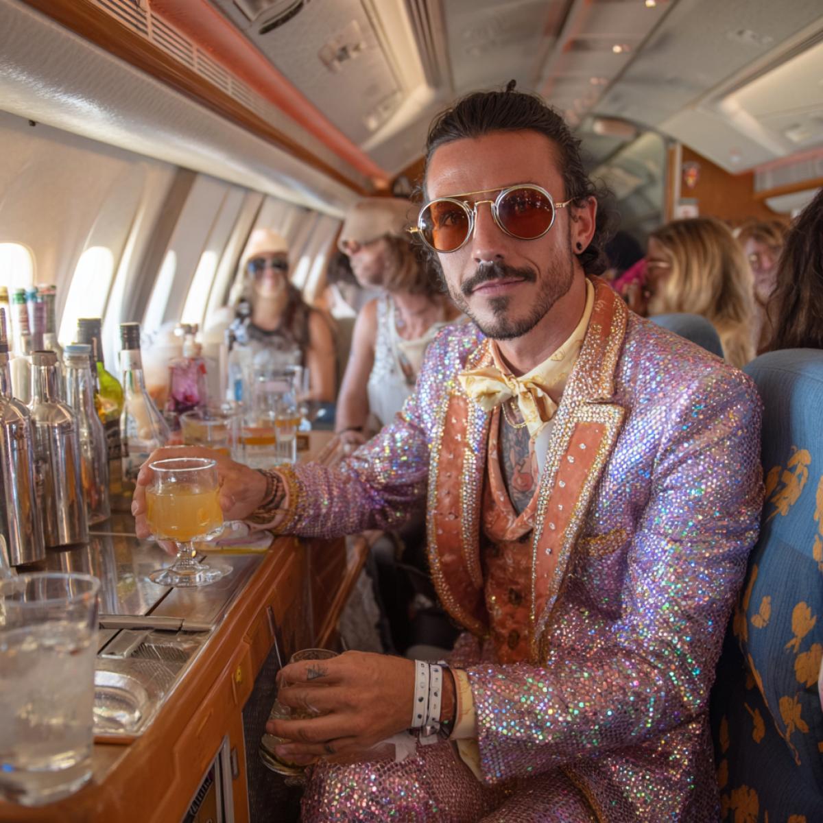 Disco on an airplane with a bartender