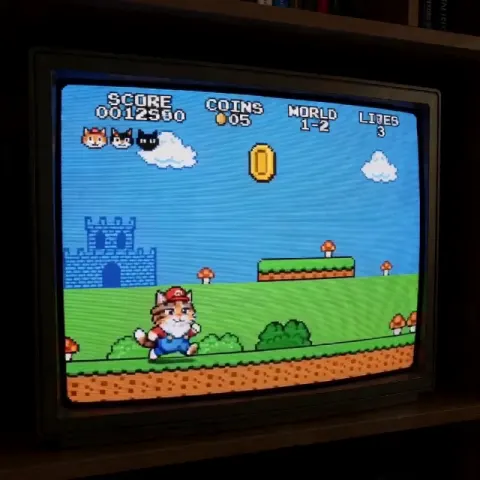 8bit игра на приставке играется, приключения кошек в стиле марио с характерными звуками 8bit игр.