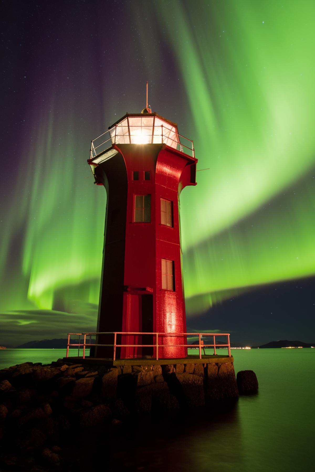 Night, northern lights, lighthouse in the Faroe Islands